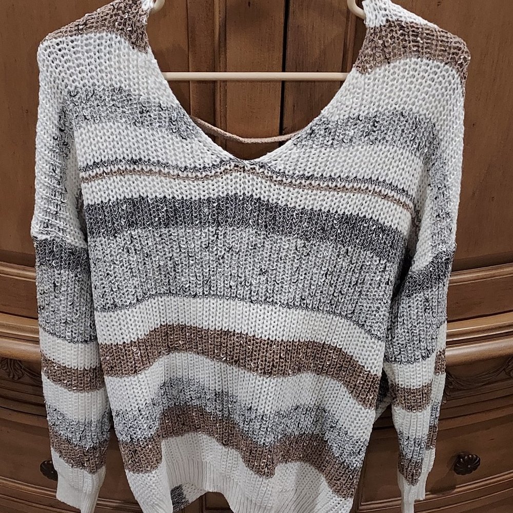 Neutral twisted back sweater